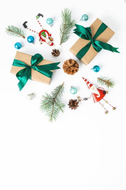 istock Christmas decorations and gift box on white background with copy space top view 1277064203