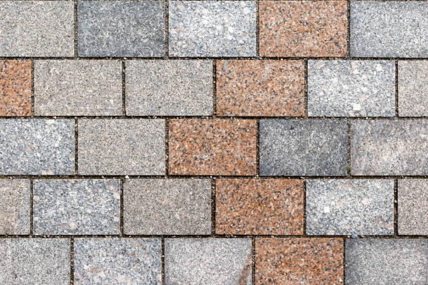 istock Overhead view of cobble stone street . Stone pavement texture 1277064540