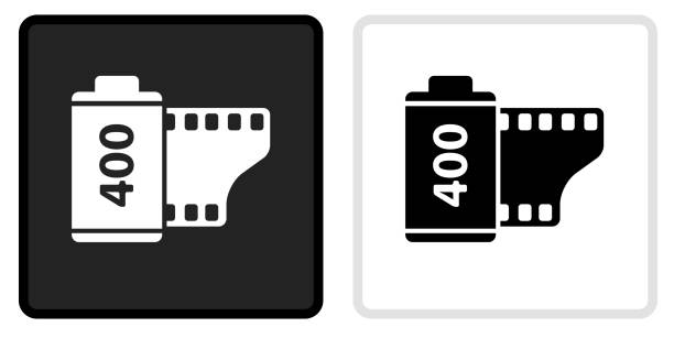Film Roll Icon on  Black Button with White Rollover Film Roll Icon on  Black Button with White Rollover. This vector icon has two  variations. The first one on the left is dark gray with a black border and the second button on the right is white with a light gray border. The buttons are identical in size and will work perfectly as a roll-over combination. rolled up photos stock illustrations