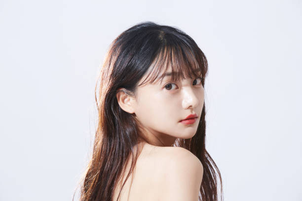 retrato conceptual de belleza de la joven asiática - cuidado corporal y belleza fotografías e imágenes de stock
