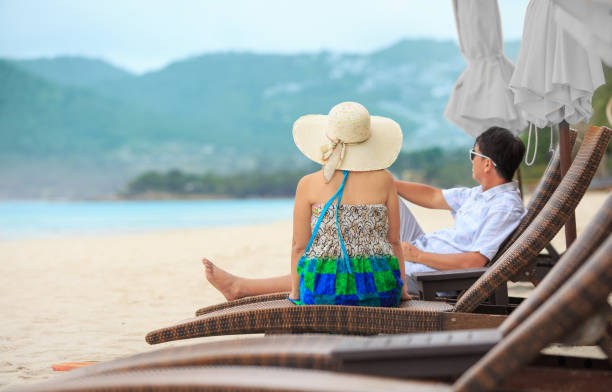 istock Middle aged couple relaxing at chaweng beach in koh samui ,Thailand. 1277069437