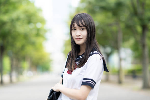 istock asian female high school student smiling 1277069523