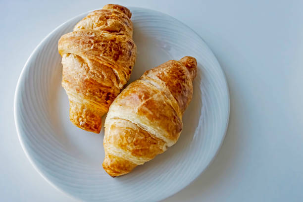 istock France's national food croissant on a white plate 1277069769