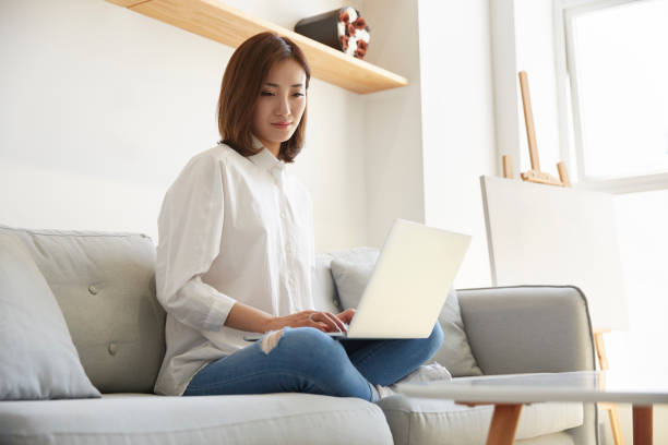 istock young asian woman working at home 1277071849