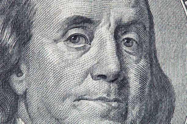 istock Benjamin Franklin portrait on one hundred dollar bill 1277072756