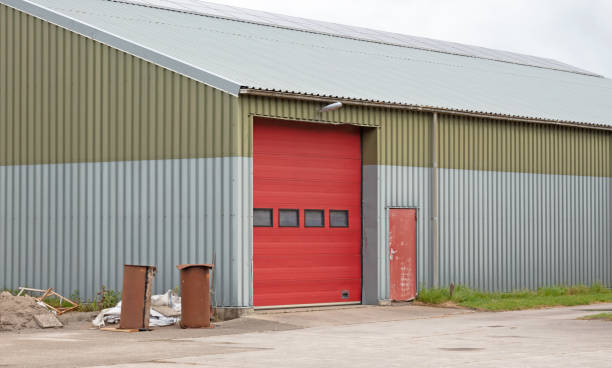 istock Large shed with red door, for large vehicles 1277074261