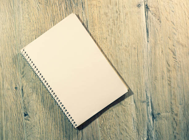 istock Background for writing notepad on a shabby wooden table 1277074957