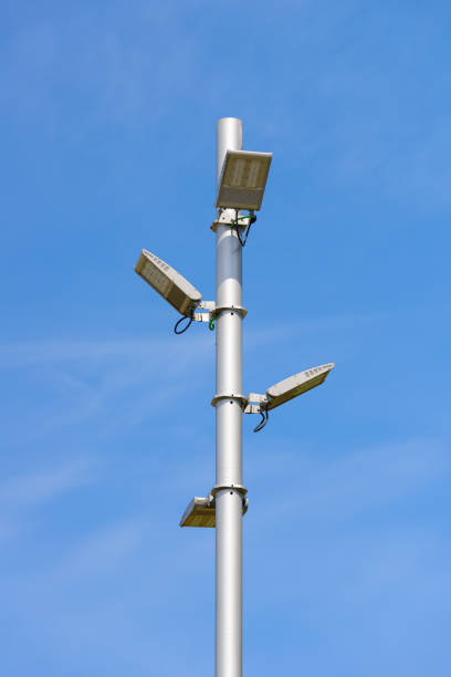 istock street lamp with LED lamps on blue sky background 1277075400