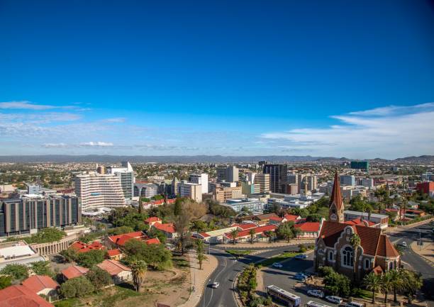 Skyline of Namibia's capital Windhoek with a cloudy sky stock photo
