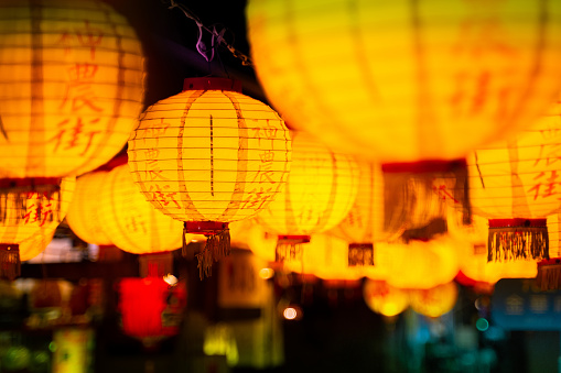Tainan / Taiwan - August 12 2019: Lanterns hung up in street in Tainan. With the name of the street labeling on them.