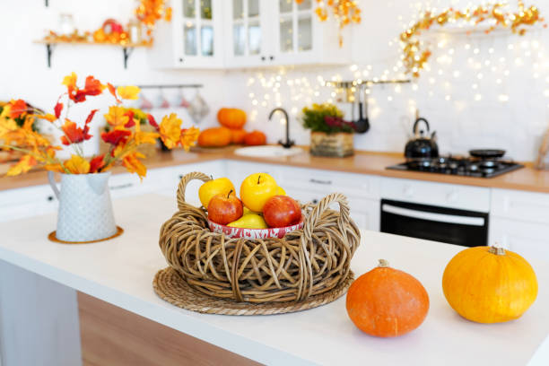 istock Autumn table setting with pumpkins and falling leaves. Thanksgiving dinner and autumn decoration. 1277079826