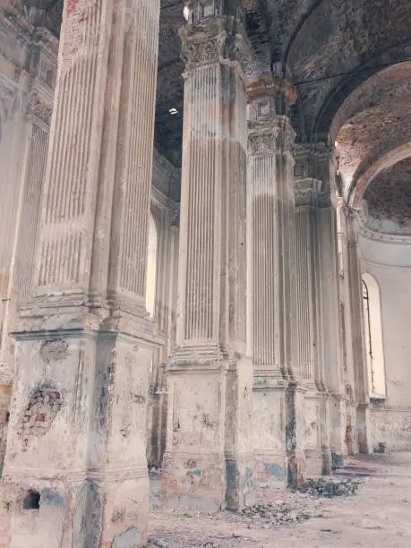 Photo of Ruins of ancient Lutheran church in Odessa, Ukraine. Historic building in 1803 built first German settlers destroyed by vandals of proletariat during revolution in Russia in 20th century.