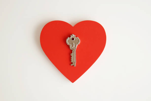 istock Cute red heart and key. 1277090795