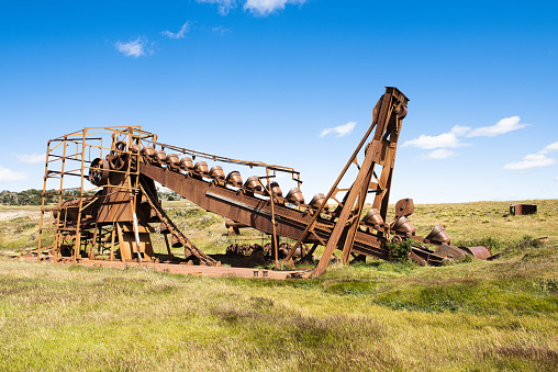 Abandoned dredge used to mine gold in the beginning of 20th century (1904-1910). It was brought by the English during the gold rush. Tierra del Fuego, Chile