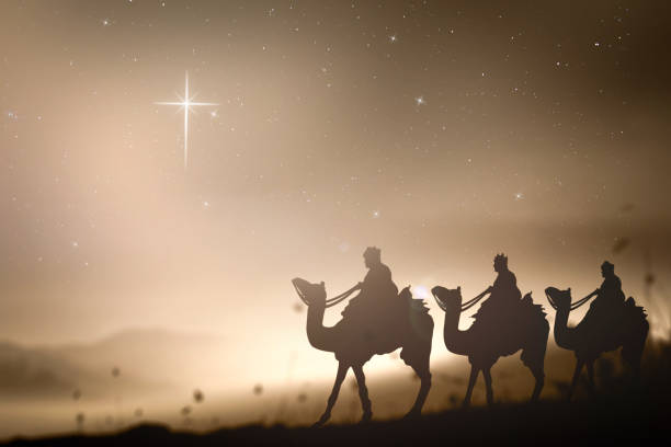 weihnachtsreligiösekrippe konzept - journey camel travel desert stock-fotos und bilder