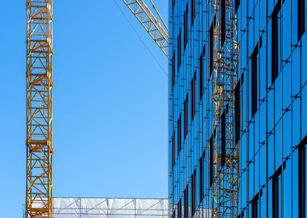 istock Low Angle View Of Crane Against Blue Sky 1277095481