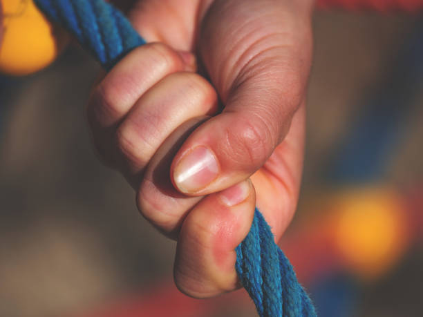 istock Spider Twisted Ropes Web With Holding Female Hands Show Abstract Object For Photos. Make A Fun 1277095589