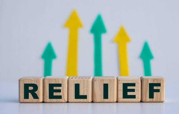 istock RELIEF - word on wooden cubes on a light background with arrows up 1277095816