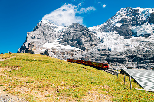 Snowy mountain and train at Jungfrau Eigergletscher in Switzerland