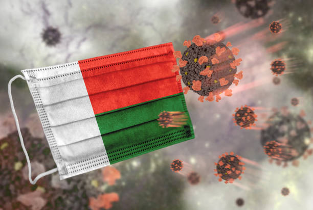 istock Face mask with flag of Madagascar, defending coronavirus 1277099613