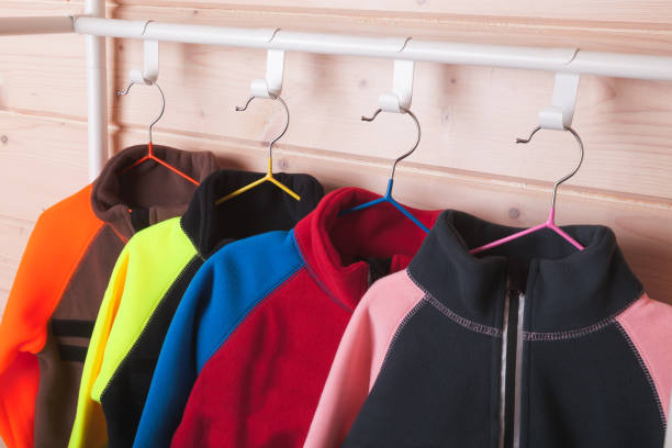 istock Colorful fleece jackets are on rack 1277100800