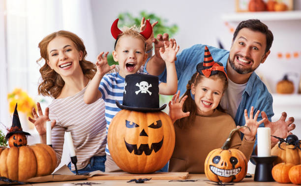 istock Delighted family during Halloween celebration 1277100837