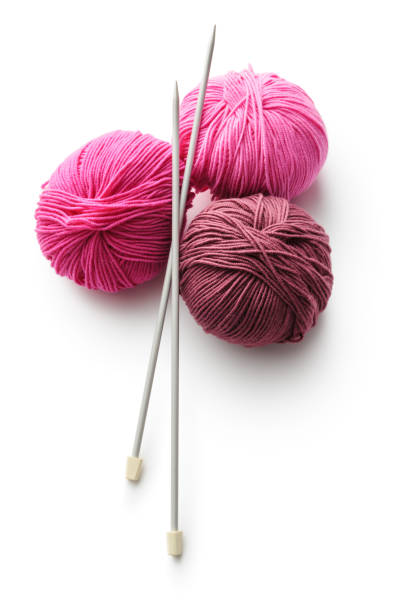 istock Textile: Balls of Wool and Knitting Needles Isolated on White Background 1277100862