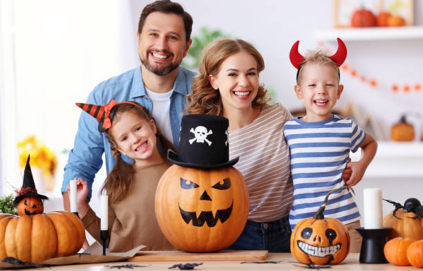 istock Delighted family during Halloween celebration 1277101521