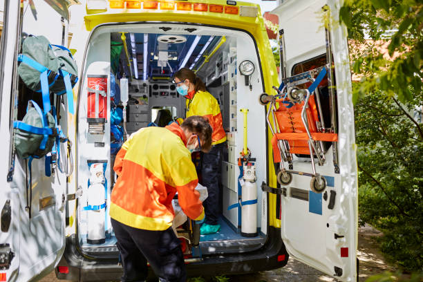 istock Paramedic Staff Bringing Patient on Stretcher 1277102356