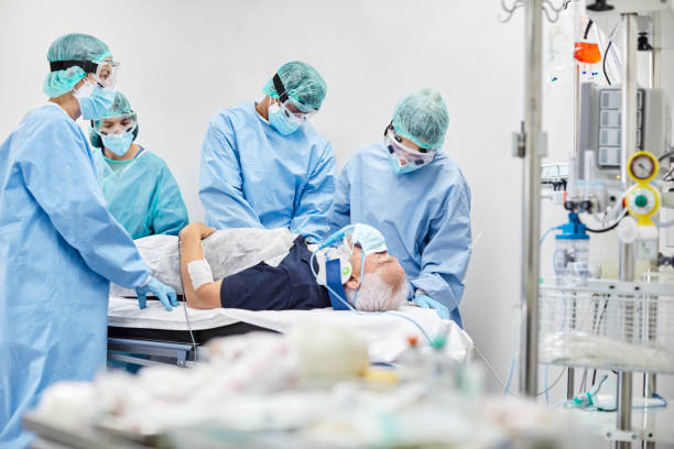 istock Doctors and Nurses Operating Patient in Hospital During COVID-19 1277102714