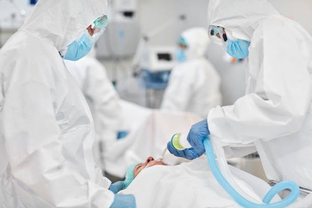 istock Medical Professionals Treating Patient at ICU 1277102842