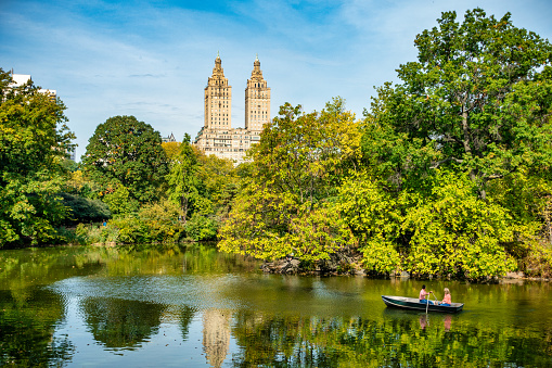 Beautiful lake with raw boats in New York Central Park