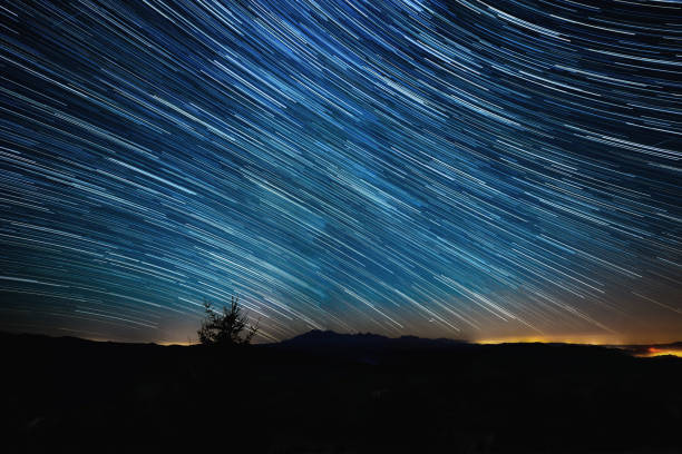 beautiful landscape with valleys, lakes and rivers with startrails