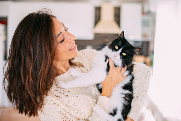istock Cute Urban Woman Hugging Her Cat 1277105748