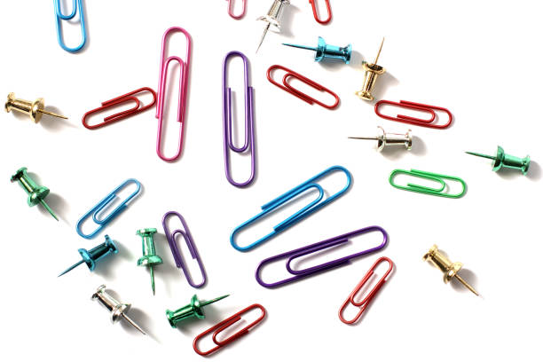 istock Paper clips on a white background. Stationery. Background. 1277106399