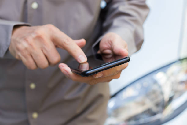 istock Close up of a man using mobile smart phone 1277107815