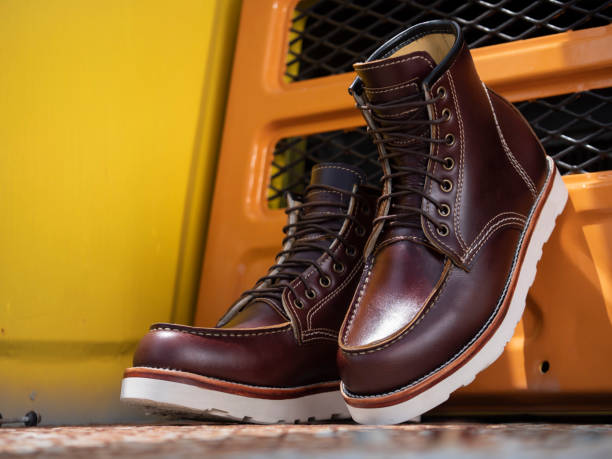 istock Man fashion brown boot leather on the floor. 1277108929