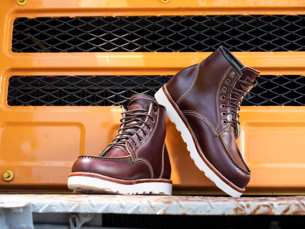 istock Man fashion brown boot leather on the floor. 1277109011
