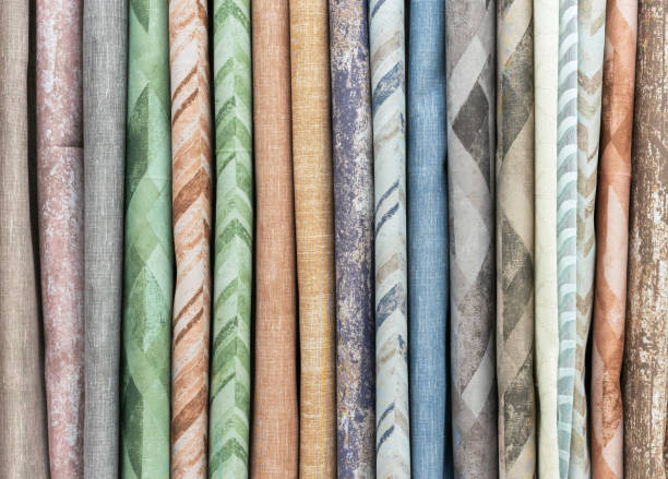 istock Samples of curtain fabrics. Background and texture of curtains. 1277109919