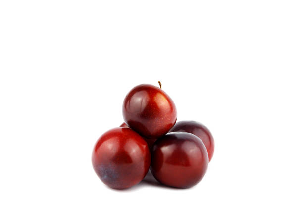 istock Sweet delicious plums isolated on white background 1277110428