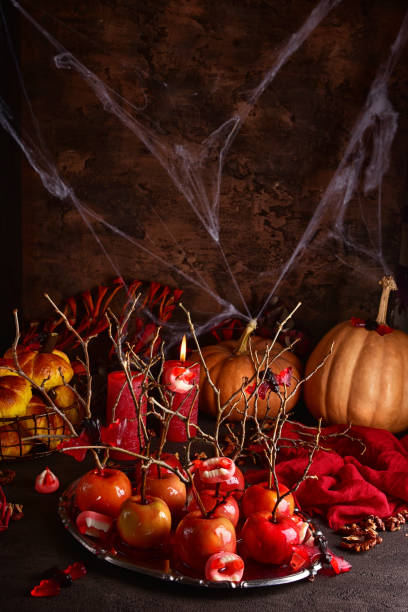 istock Still life with food for halloween. Sweets, apples, candies. 1277110719