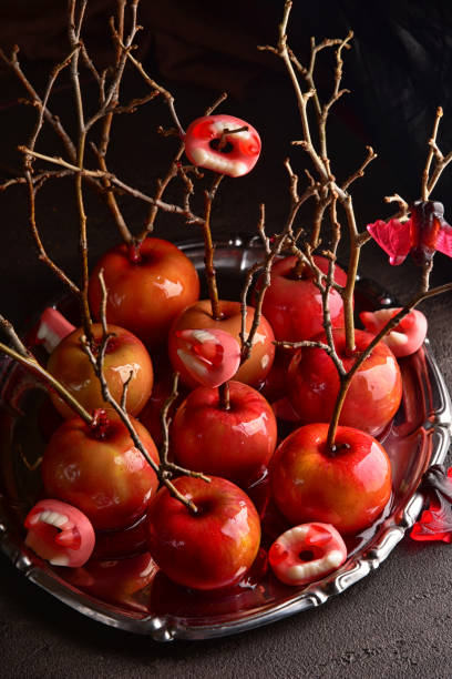 istock Still life with food for halloween. Sweets, apples, candies. 1277110851