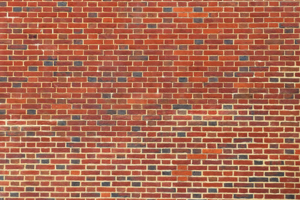 istock Old brick wall. Texture of old weathered brick wall panoramic background 1277114530