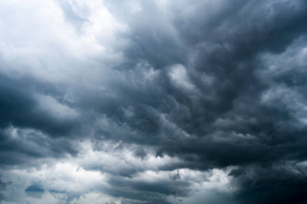 dark storm clouds with background,Dark clouds before a thunder-storm. dark storm clouds with background,Dark clouds before a thunder-storm. stratus clouds stock pictures, royalty-free photos & images