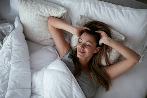 istock Girl lying on bed. 1277127011