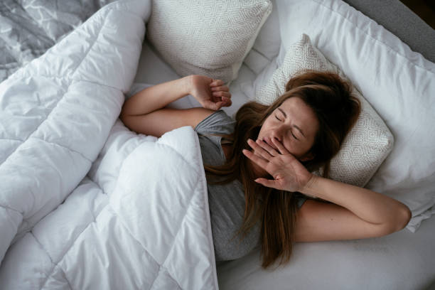 istock Girl lying on bed. 1277127034