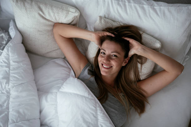 istock Girl lying on bed. 1277127157