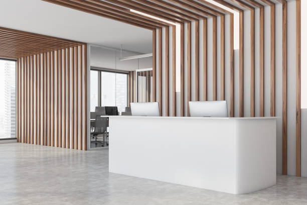 istock White reception desk in wooden office corner 1277127287