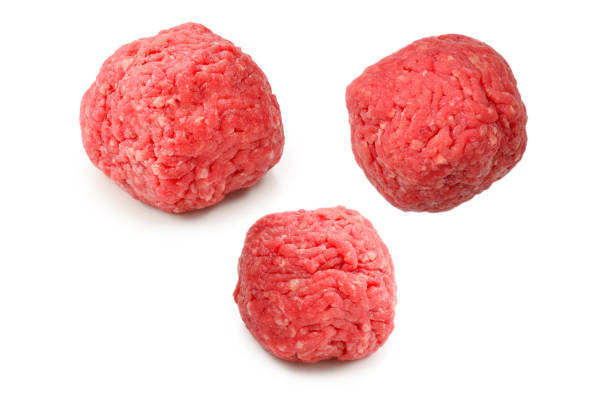 istock Raw meat balls isolated on white background. 1277128576