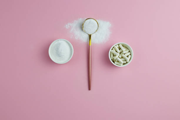 istock Collagen protein powder and capsules in jar, in spoon 1277130410
